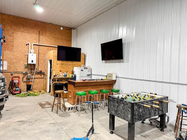 11691 County Road P, Bagley, WI 53801 - game room with concrete floors and water heater