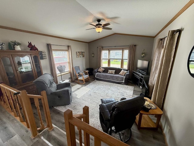 33150 Donna Dr, Prairie Du Chien, WI 53821 - living area with ceiling fan, vaulted ceiling, wood finished floors, and crown molding