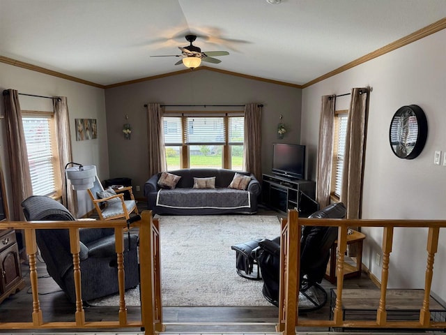33150 Donna Dr, Prairie Du Chien, WI 53821 - living room featuring a ceiling fan, wood finished floors, lofted ceiling, and ornamental molding