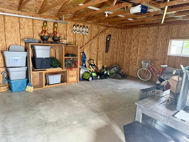 33150 Donna Dr, Prairie Du Chien, WI 53821 - garage featuring a garage door opener