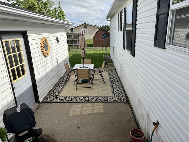33150 Donna Dr, Prairie Du Chien, WI 53821 - view of patio / terrace featuring outdoor dining area and area for grilling