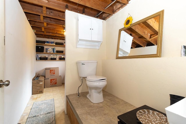 1120 Alva St, Menasha, WI 54952 - bathroom featuring toilet and tile patterned flooring