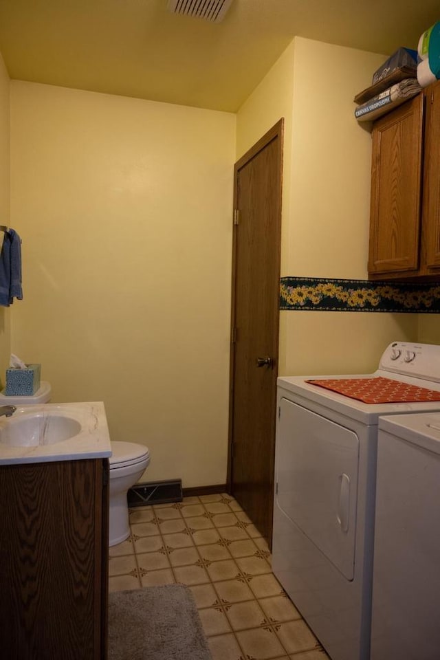 1656 Czech Dr, Friendship, WI 53934 - laundry area with washing machine and dryer and light flooring
