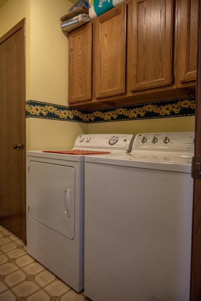 1656 Czech Dr, Friendship, WI 53934 - laundry area featuring washer and clothes dryer and cabinet space