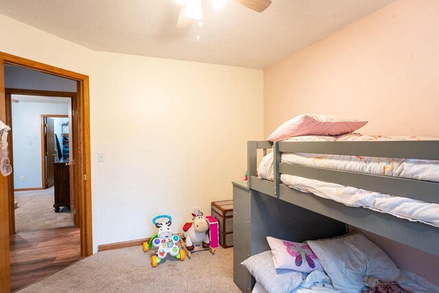 24301 Dexter Ave, Tomah, WI 54660 - bedroom with carpet floors, baseboards, and a ceiling fan