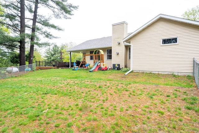 24301 Dexter Ave, Tomah, WI 54660 - back of house with a chimney