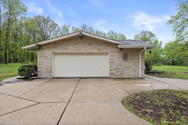 8445 S 44th St, Franklin, WI 53132 - garage featuring concrete driveway