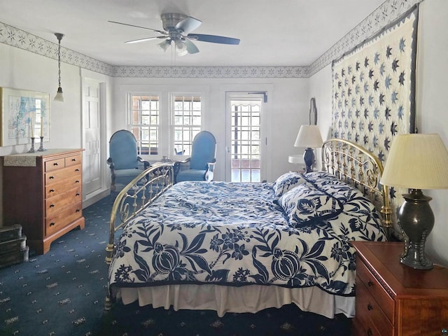 933 Nebraska Row, La Pointe, WI 54850 - bedroom with carpet floors and ceiling fan
