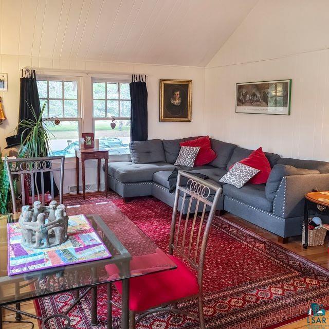 933 Nebraska Row, La Pointe, WI 54850 - living area featuring vaulted ceiling