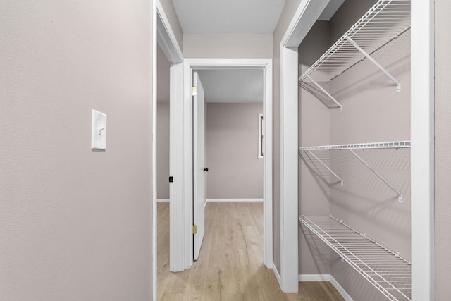 2407 Barbara Ave, Appleton, WI 54915 - walk in closet featuring wood finished floors