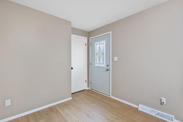 2407 Barbara Ave, Appleton, WI 54915 - foyer entrance featuring light wood-style flooring and baseboards