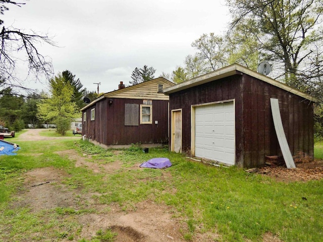 W8666 County Rd K, Elcho, WI 54428 - view of front of house featuring an outdoor structure
