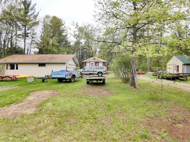 W8666 County Rd K, Elcho, WI 54428 - view of green lawn featuring view of wooded area