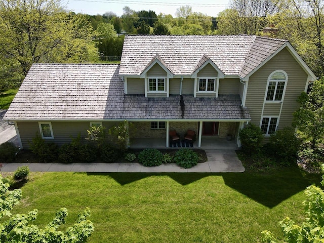 11616 N Lantern Ln, Mequon, WI 53092 - view of front of home featuring a front yard and a patio
