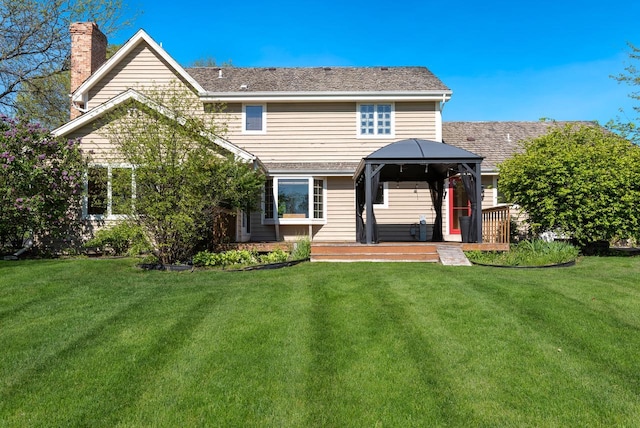 11616 N Lantern Ln, Mequon, WI 53092 - back of house with a gazebo, a chimney, and a yard