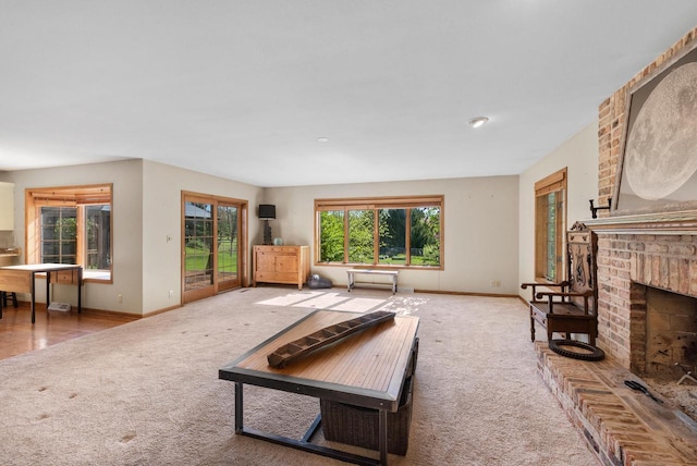 11616 N Lantern Ln, Mequon, WI 53092 - carpeted living room with baseboards and a brick fireplace
