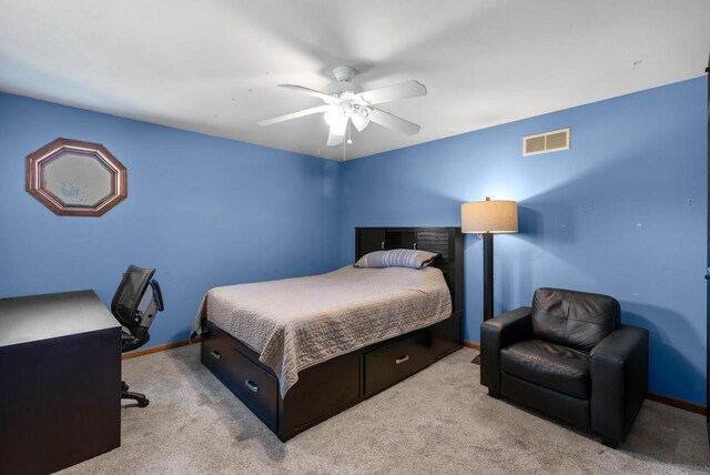 11616 N Lantern Ln, Mequon, WI 53092 - carpeted bedroom with baseboards, a ceiling fan, and a desk