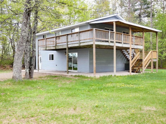N11475 Post Lake Dr, Elcho, WI 54428 - rear view of property featuring a patio area, a wooden deck, a lawn, and stairway