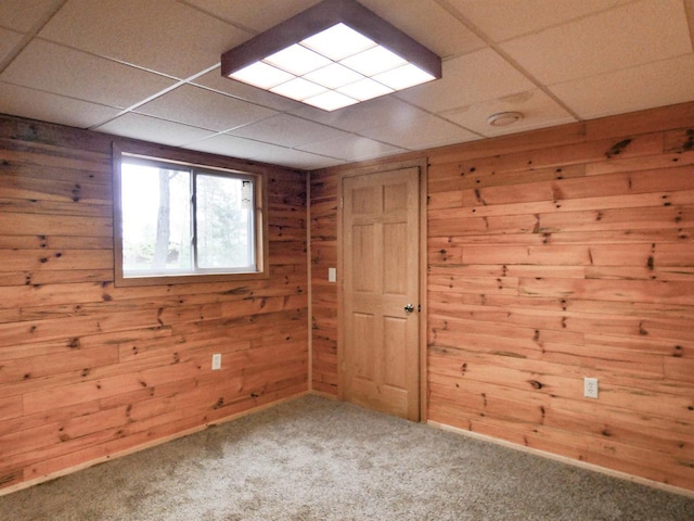N11475 Post Lake Dr, Elcho, WI 54428 - carpeted empty room featuring wood walls and a paneled ceiling