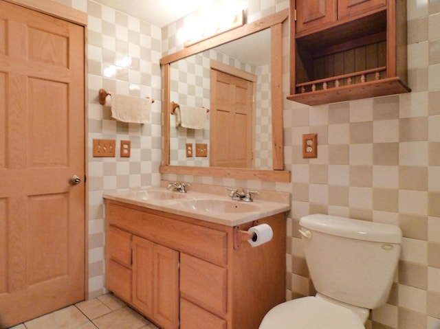 N11475 Post Lake Dr, Elcho, WI 54428 - bathroom featuring double vanity, toilet, tile walls, tile patterned flooring, and tasteful backsplash