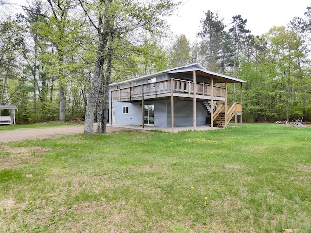 N11475 Post Lake Dr, Elcho, WI 54428 - back of house with a deck, a lawn, and stairs