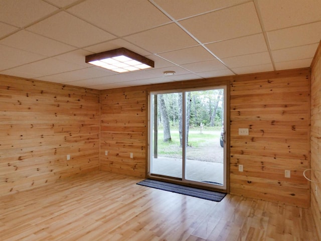 N11475 Post Lake Dr, Elcho, WI 54428 - doorway to outside with wood walls, wood finished floors, and a paneled ceiling