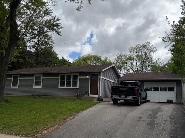 5 Daffodil Ln, Madison, WI 53714 - ranch-style home with asphalt driveway, a front yard, and an attached garage