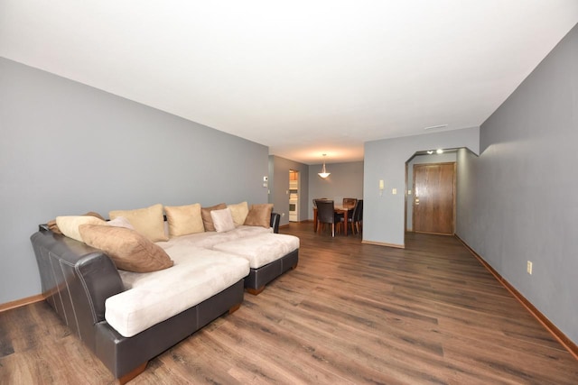 6575 N Green Bay Ave Unit 211, Glendale, WI 53209 - living area with wood finished floors and baseboards