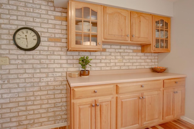 1349 93rd Ave, Kenosha, WI 53144 - kitchen with light countertops, glass insert cabinets, tasteful backsplash, and light brown cabinets