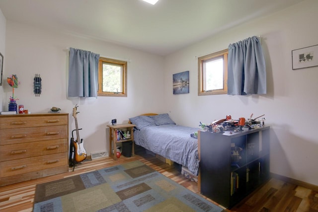 1349 93rd Ave, Kenosha, WI 53144 - bedroom featuring multiple windows and wood finished floors