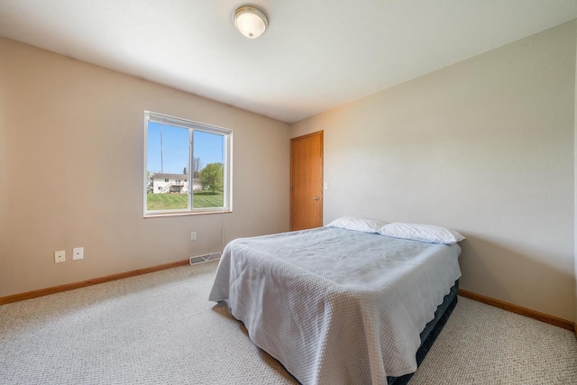 5406 Rock Rapids Dr, Weston, WI 54476 - bedroom featuring baseboards and light carpet