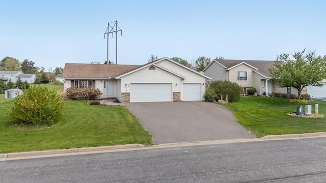 5406 Rock Rapids Dr, Weston, WI 54476 - view of front of home with an attached garage, driveway, and a front yard