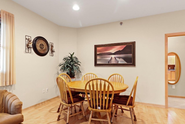 115 E Broadway Unit 210, Monona, WI 53716 - dining room with wood finished floors and baseboards