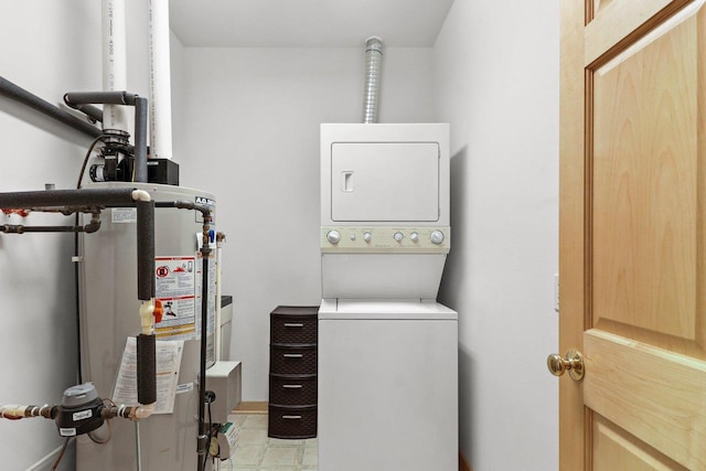 115 E Broadway Unit 210, Monona, WI 53716 - washroom featuring stacked washer / drying machine and water heater