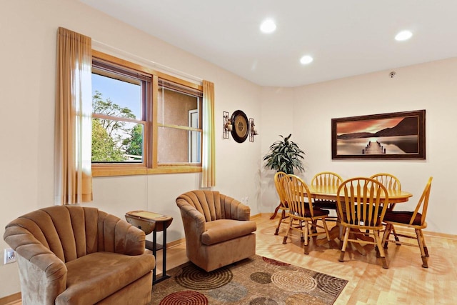 115 E Broadway Unit 210, Monona, WI 53716 - dining room with recessed lighting, baseboards, and wood finished floors