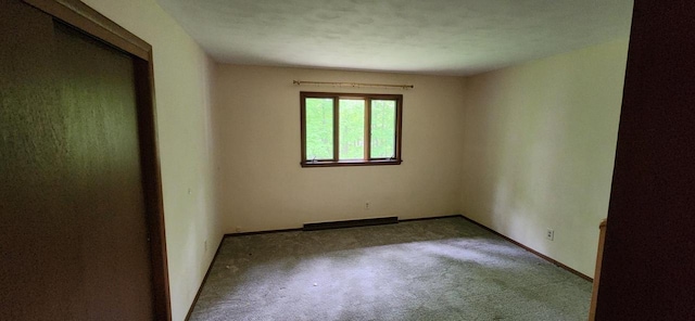 3315 N 12th St, Wausau, WI 54403 - spare room featuring carpet and baseboards