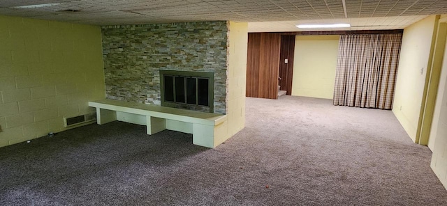 3315 N 12th St, Wausau, WI 54403 - unfurnished living room with carpet floors and a fireplace