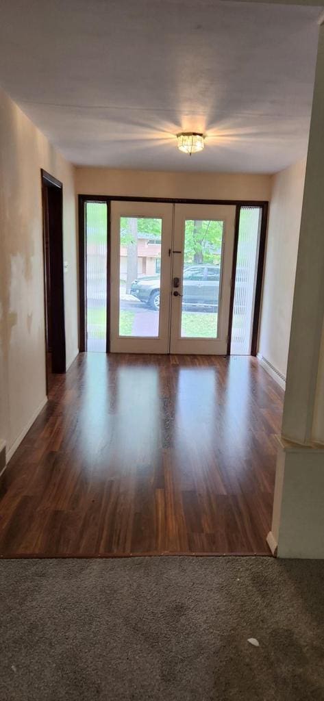 3315 N 12th St, Wausau, WI 54403 - unfurnished room featuring healthy amount of natural light, french doors, and wood finished floors