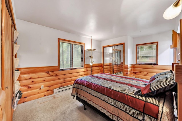 N7119 River Dr, Shawano, WI 54166 - bedroom featuring log walls and a baseboard radiator