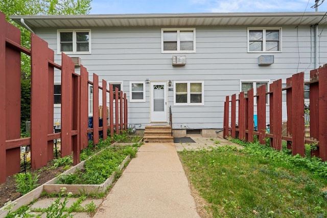 1416 21st Ave S, Wisconsin Rapids, WI 54495 - view of front of home with entry steps and a garden