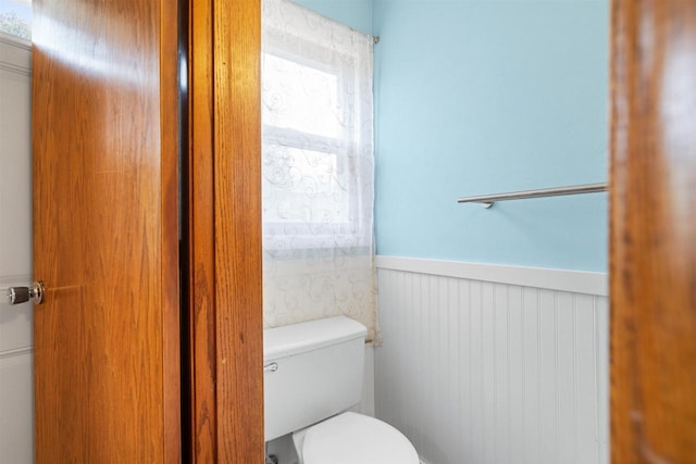 1416 21st Ave S, Wisconsin Rapids, WI 54495 - bathroom with a wainscoted wall and toilet