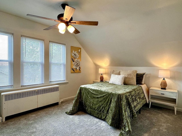 4416 75th St, Kenosha, WI 53142 - carpeted bedroom featuring radiator, vaulted ceiling, a ceiling fan, and baseboards