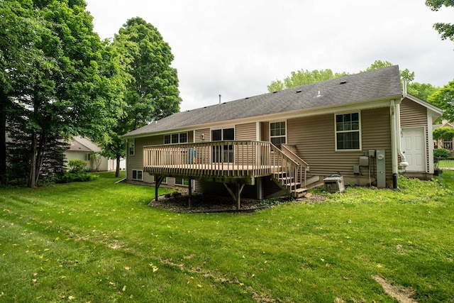 N100W14330 Sunburst Trl, Germantown, WI 53022 - rear view of property featuring a wooden deck and a lawn