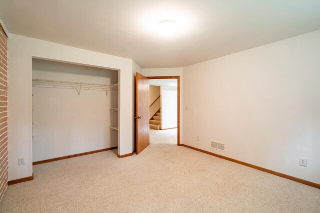 N100W14330 Sunburst Trl, Germantown, WI 53022 - unfurnished bedroom featuring baseboards and a closet