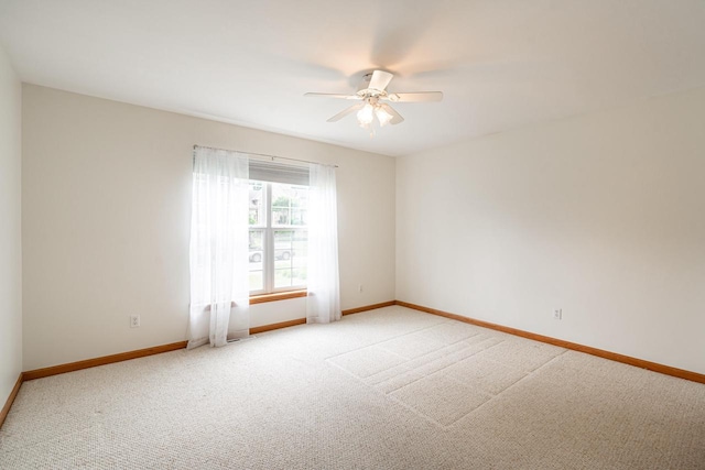 N100W14330 Sunburst Trl, Germantown, WI 53022 - unfurnished room with ceiling fan, light colored carpet, and baseboards
