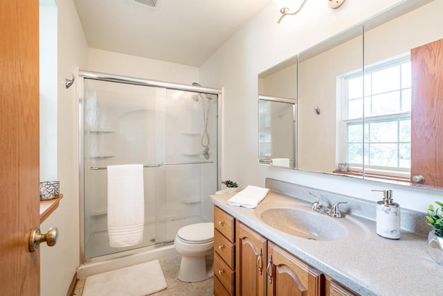 N100W14330 Sunburst Trl, Germantown, WI 53022 - full bath featuring a stall shower, vanity, toilet, and tile patterned floors