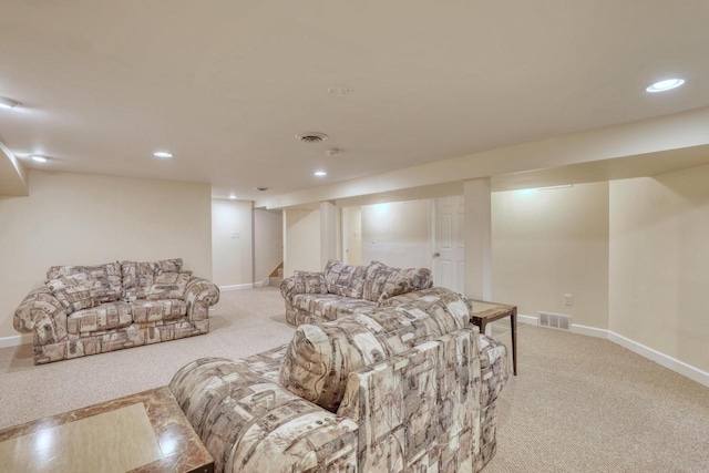 167 Po St, West Bend, WI 53090 - living area featuring light carpet, recessed lighting, and baseboards
