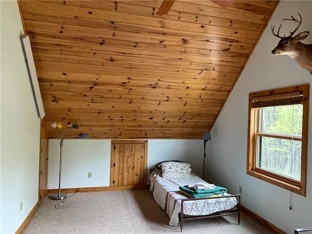 23165 Joy Villa Rd Unit 6, Glidden, WI 54527 - bedroom with lofted ceiling, light colored carpet, wooden ceiling, and baseboards