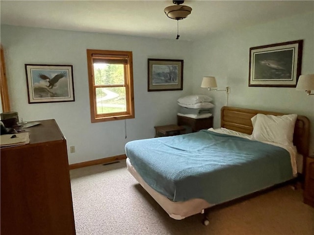 23165 Joy Villa Rd Unit 6, Glidden, WI 54527 - bedroom with light colored carpet and baseboards