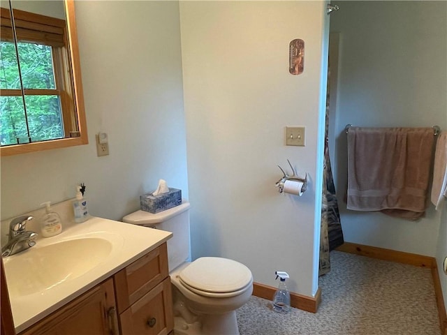 23165 Joy Villa Rd Unit 6, Glidden, WI 54527 - full bath featuring vanity, toilet, a shower with shower curtain, and baseboards